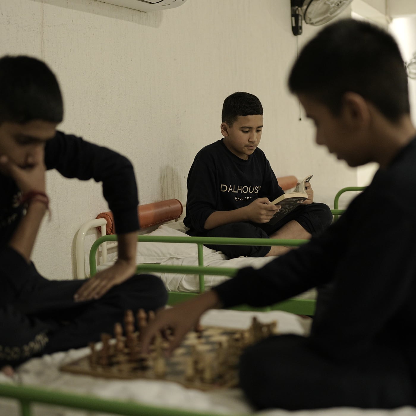Boarders playing chess in the evening