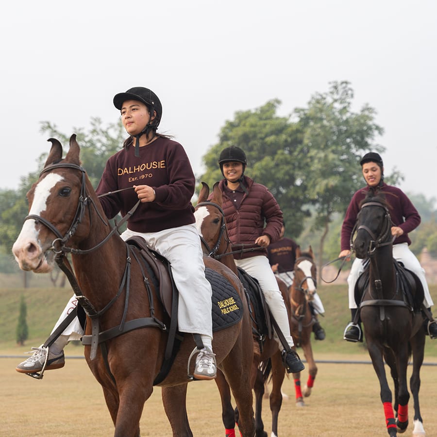 Students riding at the equestrian centre